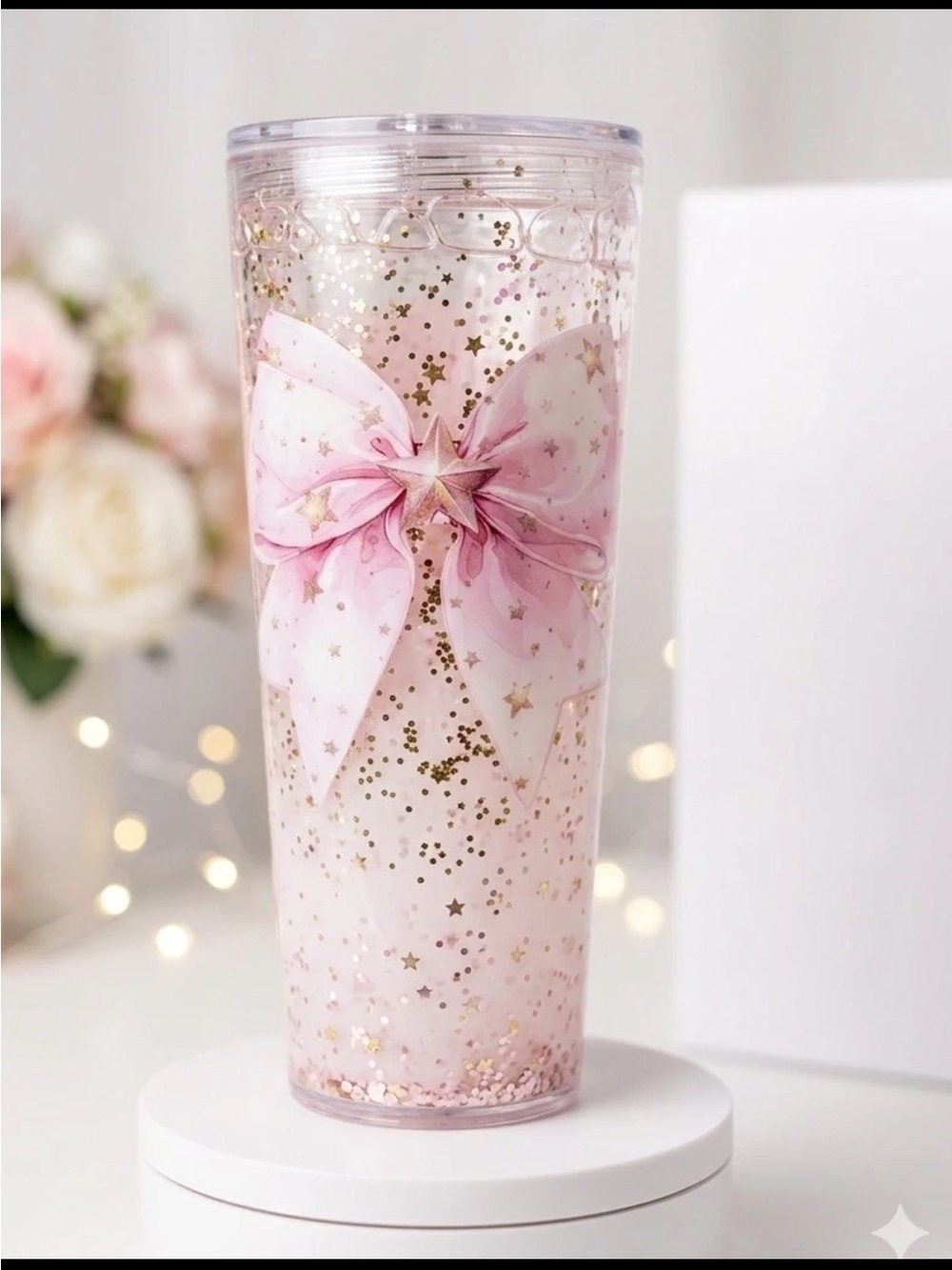 Elegant 24 oz tumbler with a pink bow and glitter design 🔆